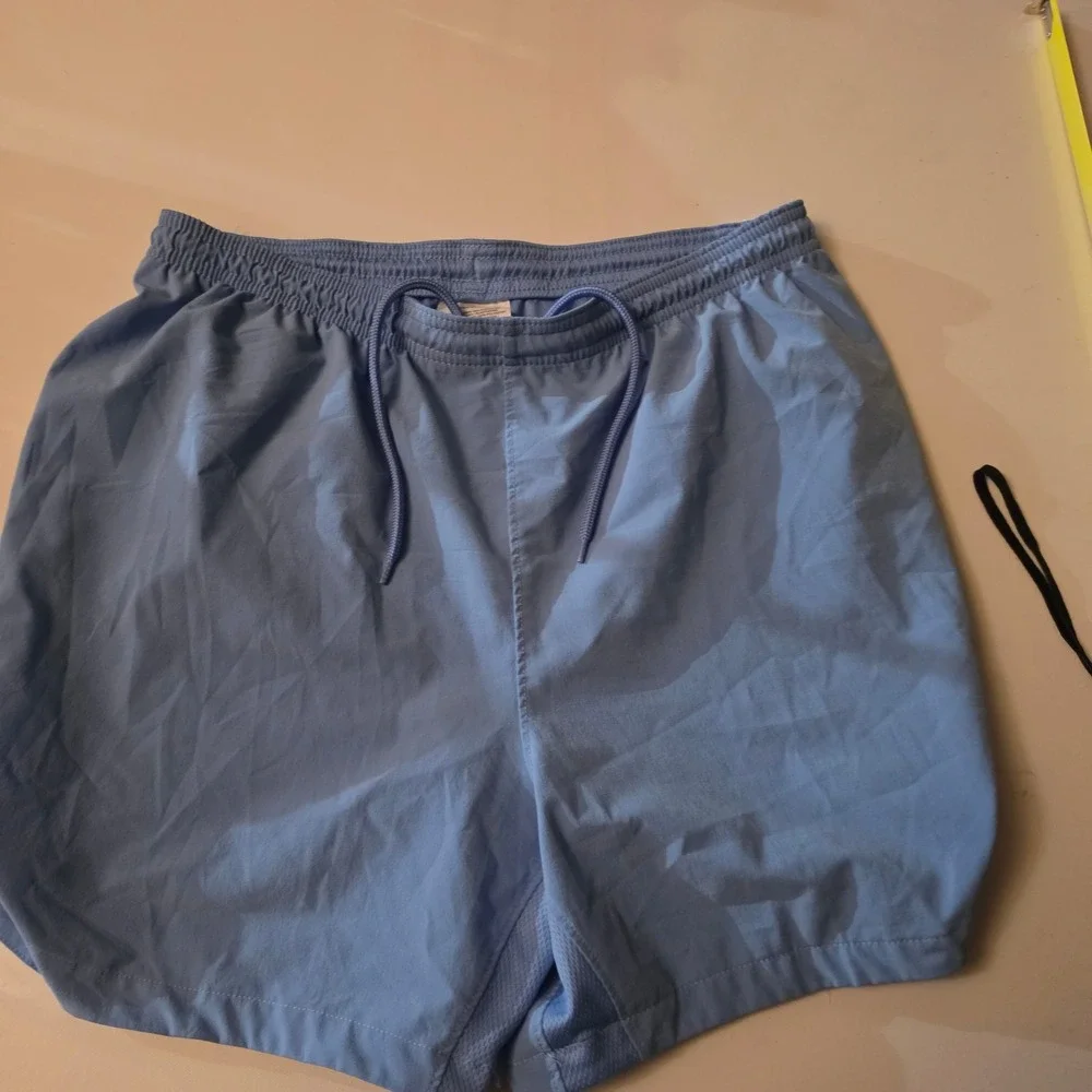 Nike Dri-FIT Womens Athletic Shorts Light Blue Running Gym Size Small